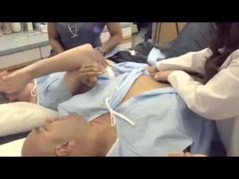 Labor Pain Simulator for Two Men as The Wives Sit Nearby VERY
