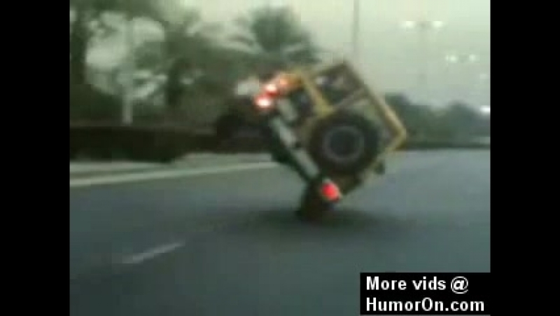 Nissan Patrol riding on 2 wheels nice