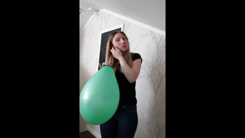 Girl blows big ballon until it
